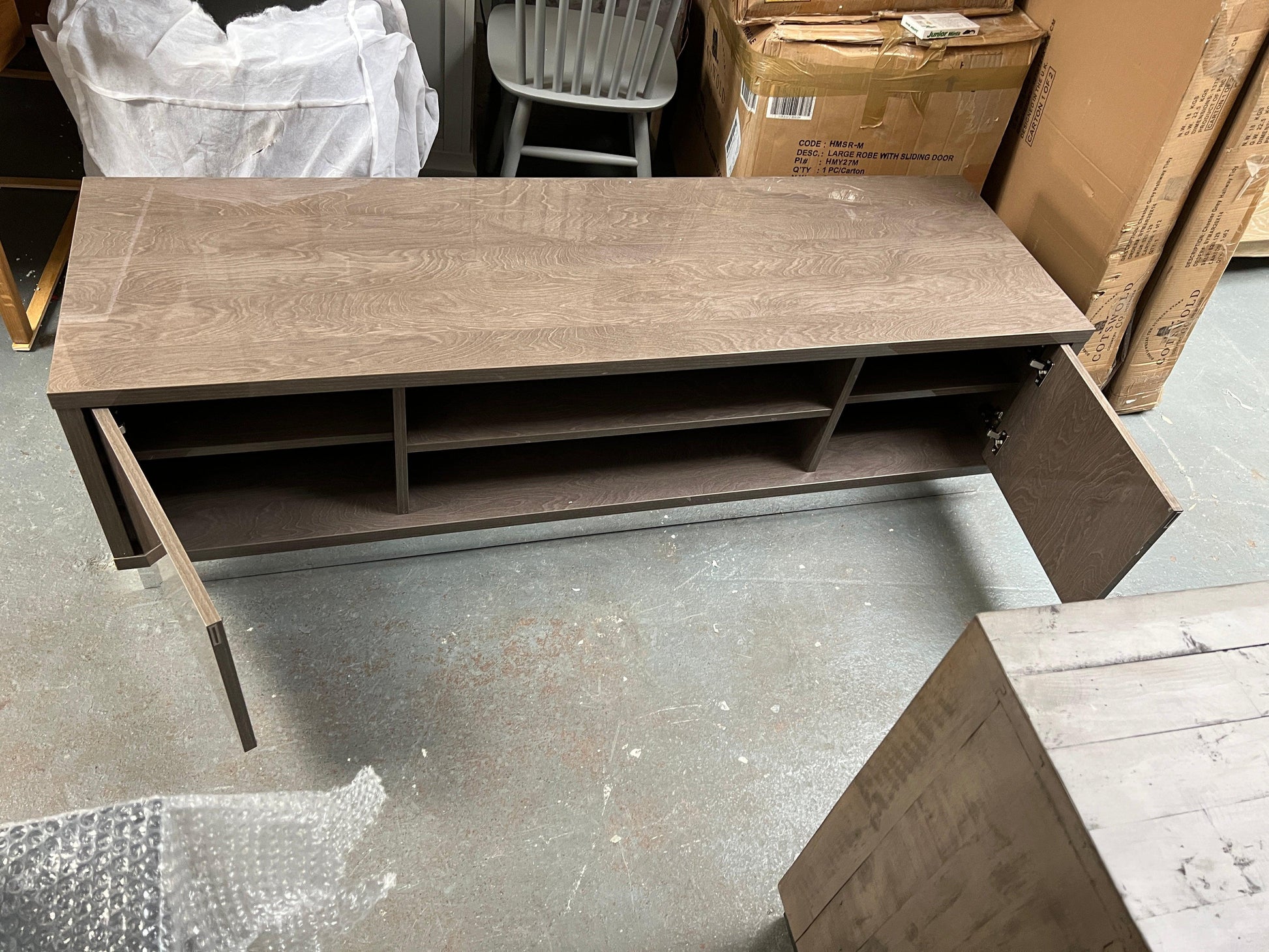 Platinum Italian High Gloss Slim tv cabinet by Modum Quality Furniture Clearance Ltd